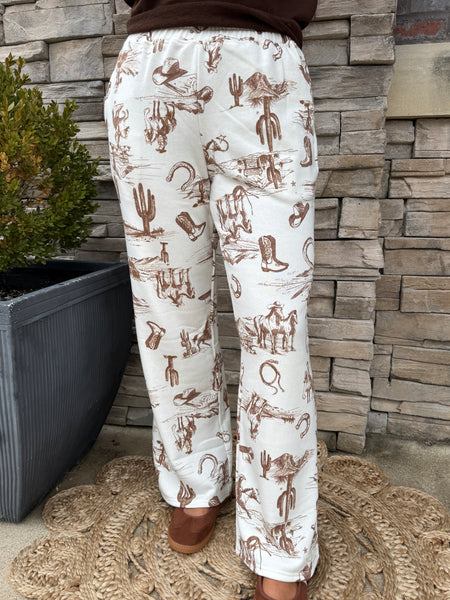 women wearing pull on casual pants with western print