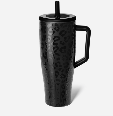 Black leopard print travel mug with a handle on a white background