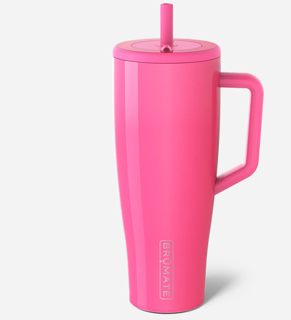 Pink travel mug with handle and straw on a white background