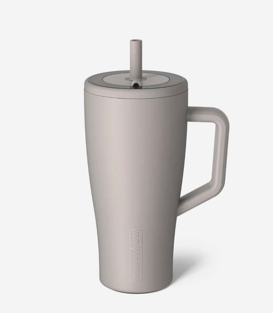 mocha mug with a lid and straw on a white background