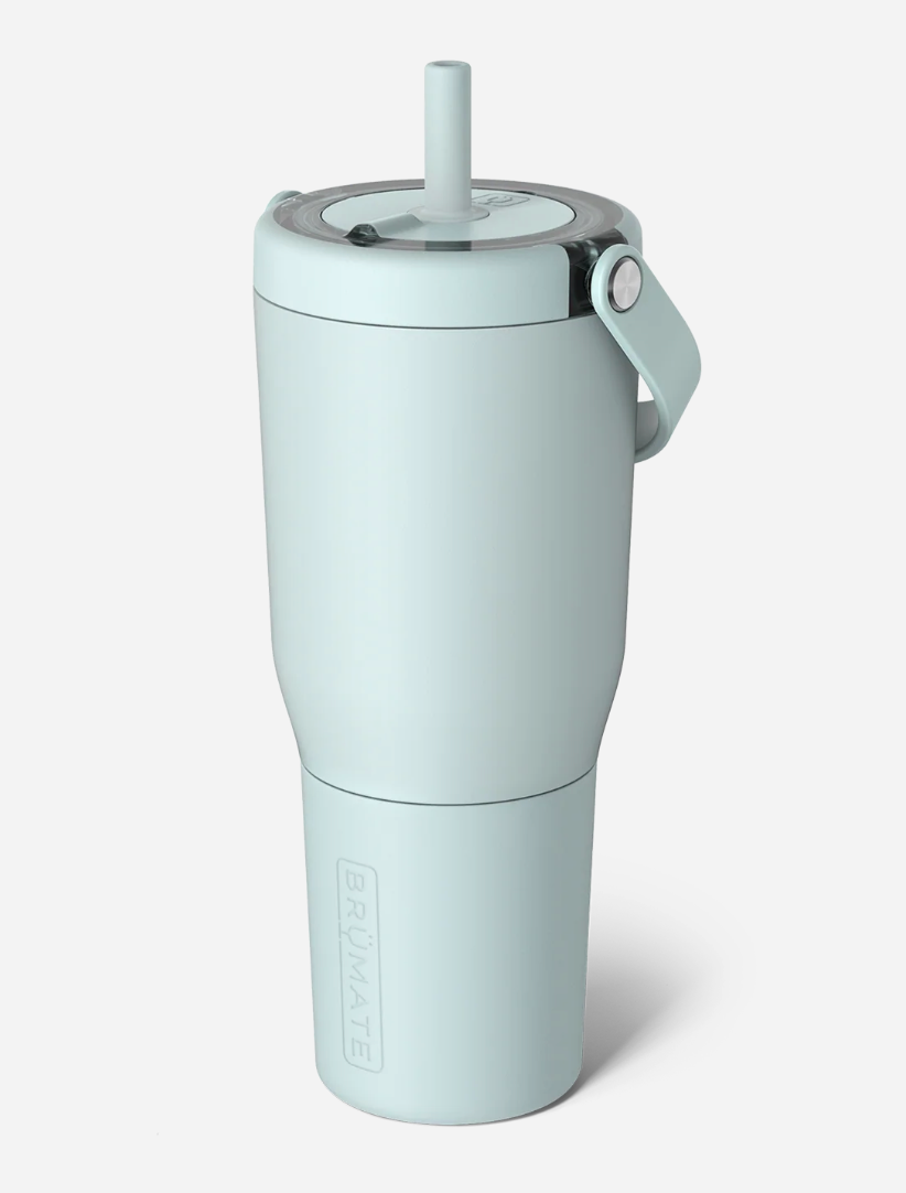 Light blue tumbler with a straw on a white background