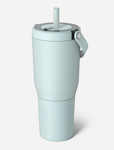 Light blue tumbler with a straw on a white background