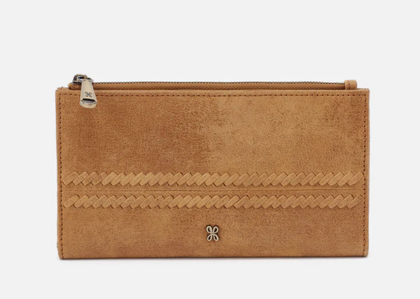Brown leather wallet with braided design on a white background